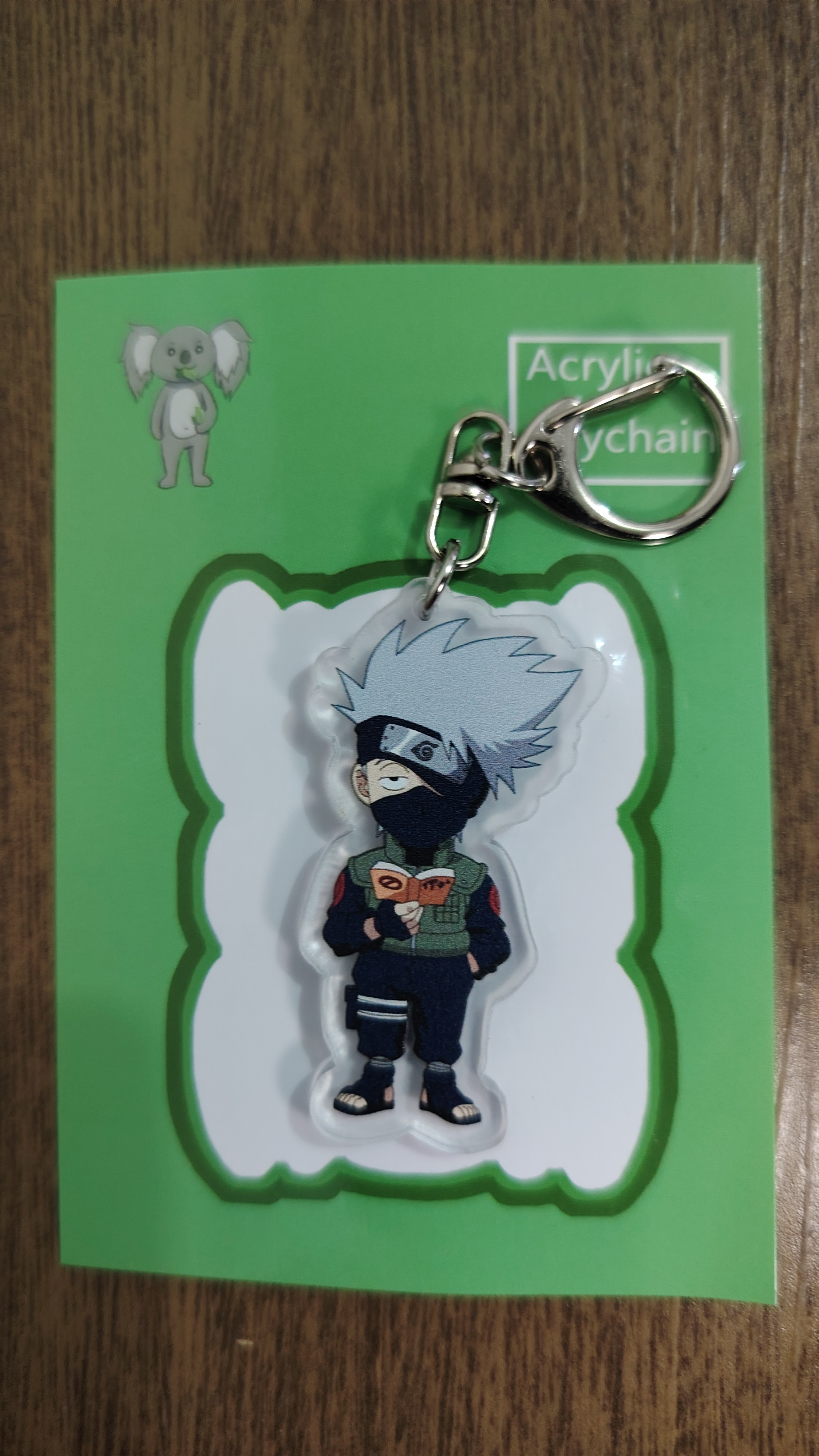 Llavero Acrílico Kakashi Leyendo
